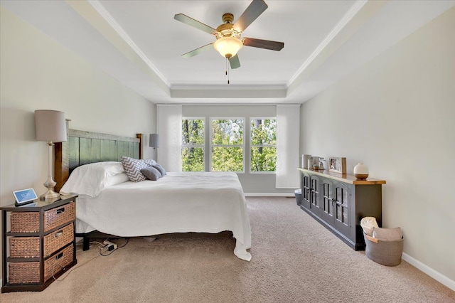 1060 Tinley Blvd, Oxford, MI 48371 - bedroom featuring a tray ceiling, carpet flooring, baseboards, and ornamental molding