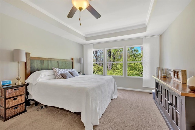 1060 Tinley Blvd, Oxford, MI 48371 - carpeted bedroom featuring a raised ceiling, a ceiling fan, baseboards, and ornamental molding