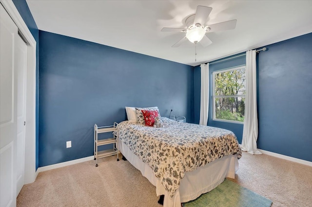 1060 Tinley Blvd, Oxford, MI 48371 - bedroom with light carpet, baseboards, a ceiling fan, and a closet