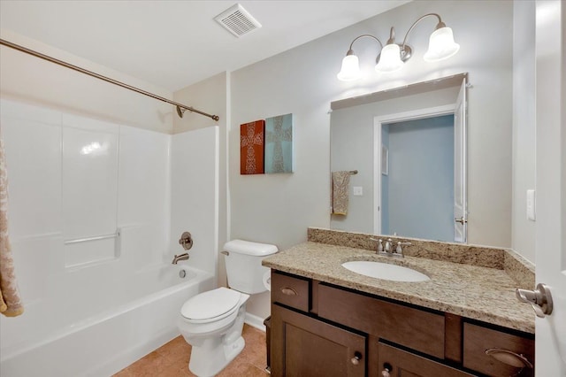 1060 Tinley Blvd, Oxford, MI 48371 - bathroom with toilet, vanity, tub / shower combination, tile patterned flooring, and baseboards