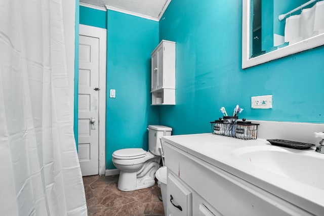 full bathroom featuring toilet and vanity