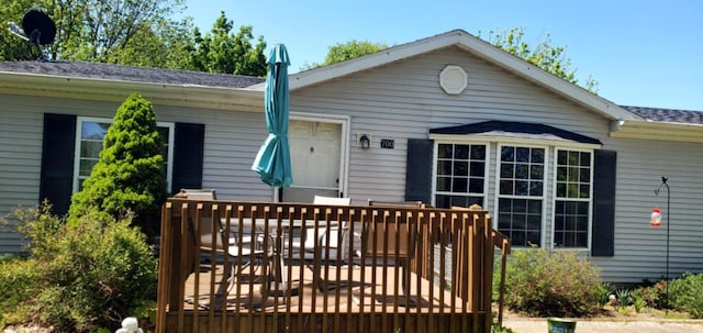 700 S Arent Rd, Watervliet, MI 49098 - rear view of property featuring a deck and roof with shingles