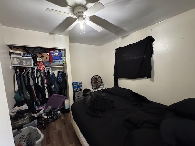 190 E Sidney Rd, Stanton, MI 48888 - bedroom with wood finished floors, a closet, and ceiling fan