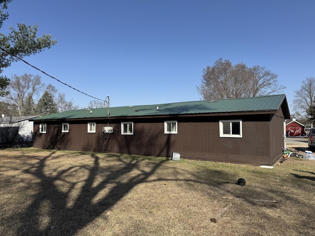 190 E Sidney Rd, Stanton, MI 48888 - rear view of house featuring metal roof