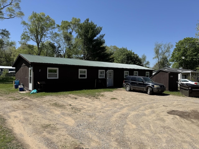 190 E Sidney Rd, Stanton, MI 48888 - ranch-style home featuring metal roof