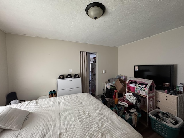 bedroom with a textured ceiling