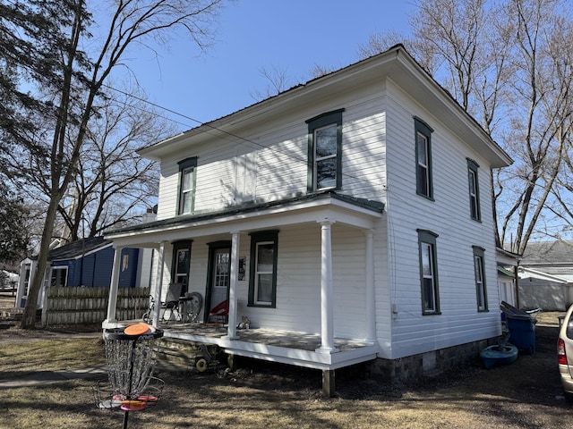view of front of property with a porch and crawl space