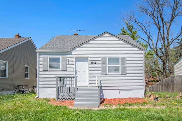 887 University Dr, Pontiac, MI 48342 - rear view of property with a shingled roof