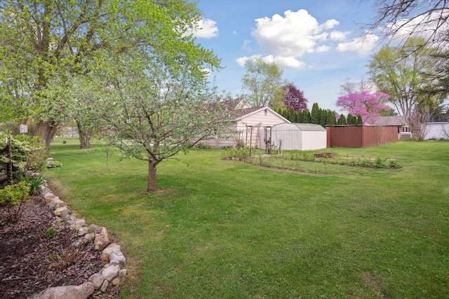 12948 Peck Ave, Sawyer, MI 49125 - view of green lawn with an outbuilding and a pole building