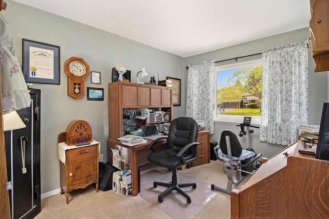 home office featuring light carpet