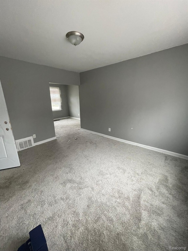 7910 Wetherby St, Detroit, MI 48210 - carpeted spare room featuring baseboards