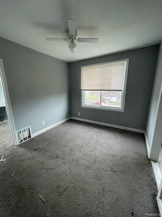 7910 Wetherby St, Detroit, MI 48210 - carpeted spare room featuring ceiling fan and baseboards