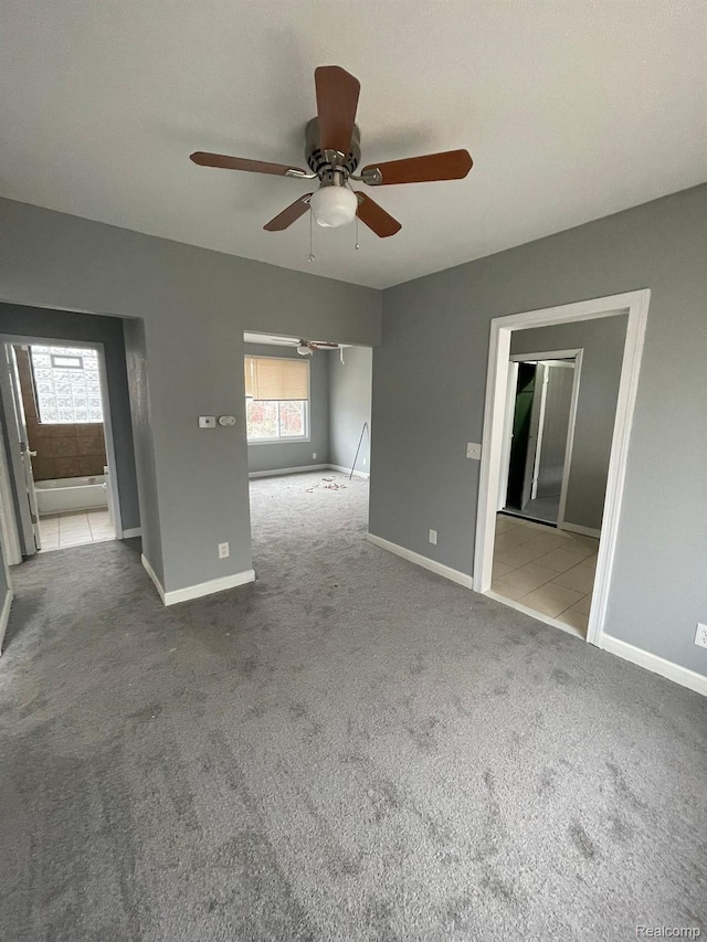7910 Wetherby St, Detroit, MI 48210 - empty room featuring ceiling fan and carpet floors