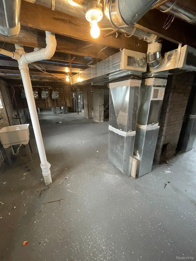 7910 Wetherby St, Detroit, MI 48210 - unfinished basement featuring a sink