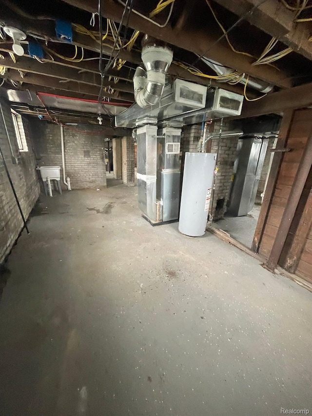 7910 Wetherby St, Detroit, MI 48210 - unfinished below grade area featuring water heater and heating unit