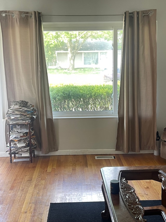 20225 Ledgestone St, Southfield, MI 48076 - interior space featuring plenty of natural light, baseboards, and wood finished floors