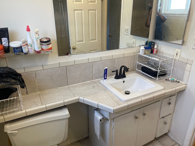20225 Ledgestone St, Southfield, MI 48076 - bathroom featuring vanity and backsplash