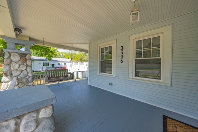 wooden deck with a porch