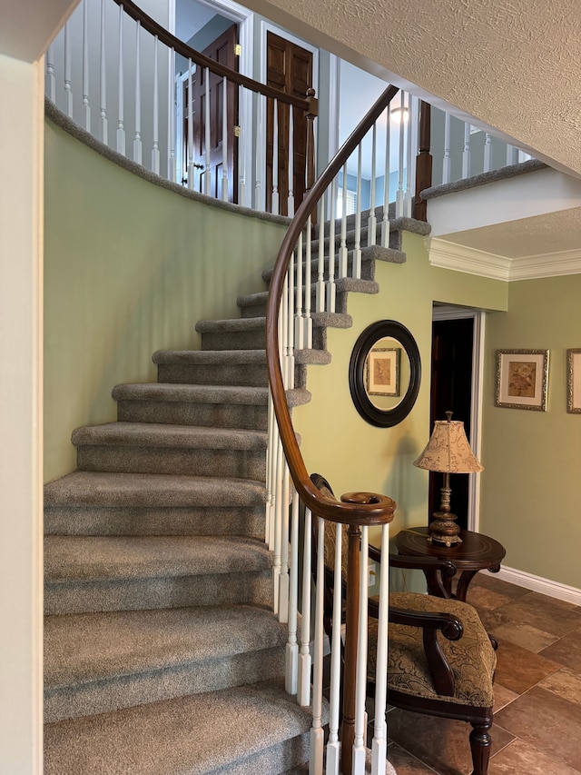41315 Carriage Hill Dr, Novi, MI 48375 - stairway featuring crown molding, baseboards, and stone finish flooring