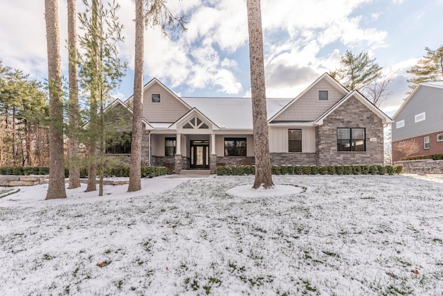 5535 W Huron River Dr, Dexter, MI 48130 - craftsman inspired home featuring stone siding and board and batten siding