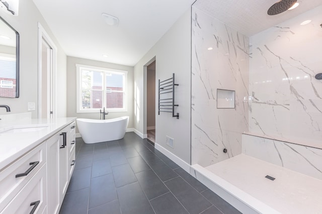 5535 W Huron River Dr, Dexter, MI 48130 - full bathroom featuring vanity, a marble finish shower, a freestanding tub, and tile patterned flooring