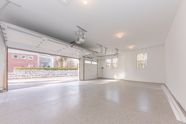 5535 W Huron River Dr, Dexter, MI 48130 - garage featuring a garage door opener