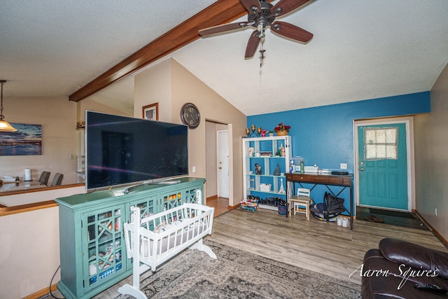 2721 Rum Creek Dr SE, Kentwood, MI 49508 - living area featuring ceiling fan, wood finished floors, and baseboards