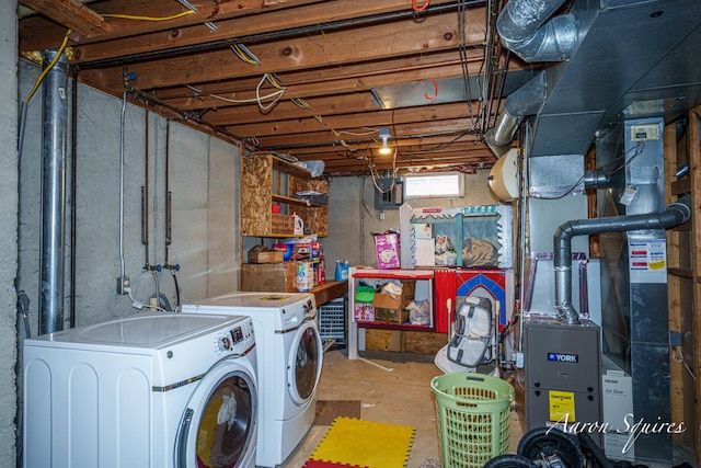 2721 Rum Creek Dr SE, Kentwood, MI 49508 - below grade area featuring washer and dryer and heating unit
