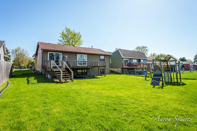 2721 Rum Creek Dr SE, Kentwood, MI 49508 - back of property featuring stairway and a wooden deck