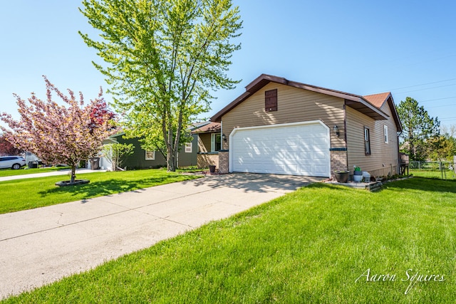 2721 Rum Creek Dr SE, Kentwood, MI 49508 - view of front of property with concrete driveway and a garage