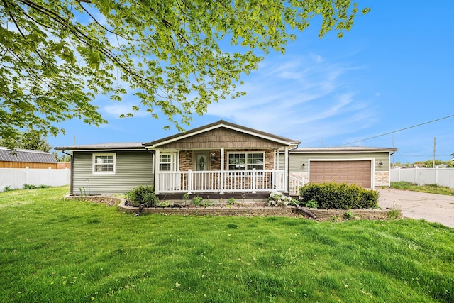 single story home featuring a porch, concrete driveway, an attached garage, and stone siding