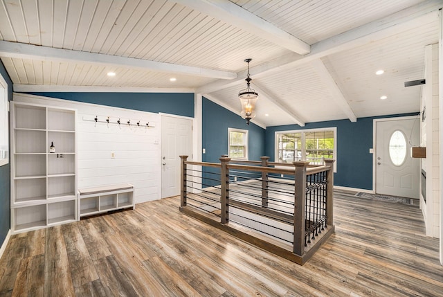 entryway featuring wood finished floors, wood ceiling, baseboards, and recessed lighting