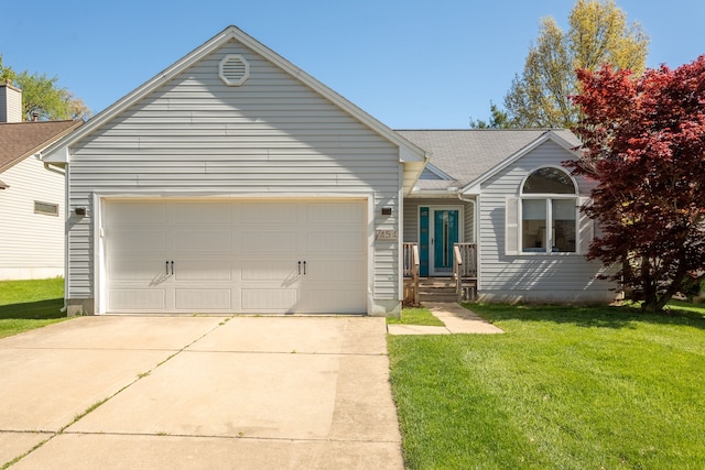 454 Woodland Dr, Saline, MI 48176 - ranch-style house featuring driveway, a garage, and a front yard