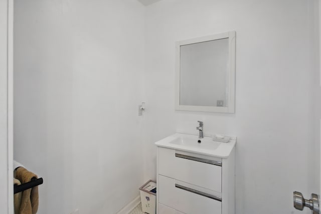 454 Woodland Dr, Saline, MI 48176 - bathroom featuring vanity and baseboards