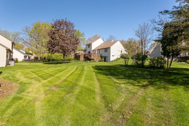 454 Woodland Dr, Saline, MI 48176 - view of grassy yard with a deck and a residential view