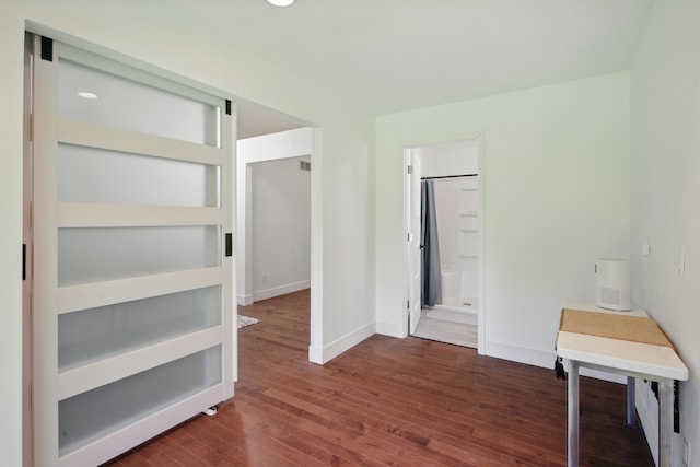 454 Woodland Dr, Saline, MI 48176 - unfurnished office with dark wood-style floors and baseboards