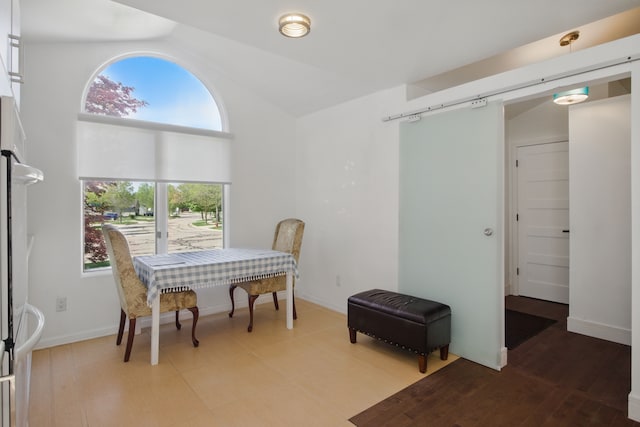 454 Woodland Dr, Saline, MI 48176 - dining space featuring vaulted ceiling