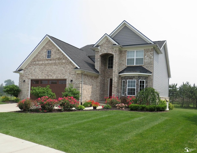 465 Corinth Cir, Dundee, MI 48131 - craftsman inspired home featuring brick siding, a front yard, a garage, and a shingled roof