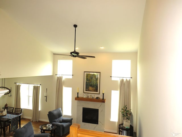 465 Corinth Cir, Dundee, MI 48131 - living room featuring a fireplace, ceiling fan, wood finished floors, baseboards, and recessed lighting