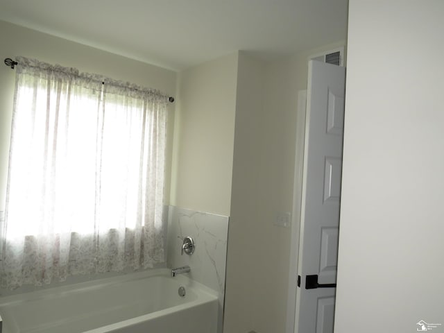 465 Corinth Cir, Dundee, MI 48131 - bathroom with a garden tub