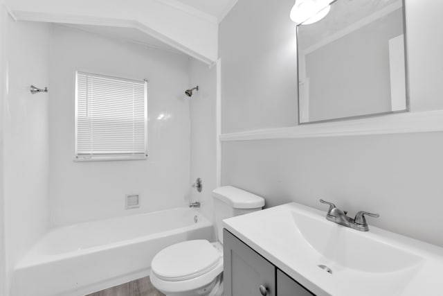 bathroom with  shower combination, toilet, and vanity