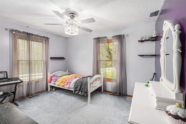 2269 W Liberty Rd, Clarklake, MI 49234 - bedroom with carpet floors, ceiling fan, a textured ceiling, and baseboards