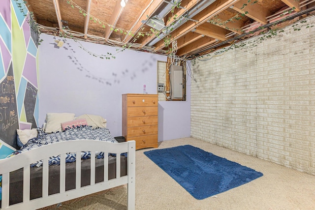 2269 W Liberty Rd, Clarklake, MI 49234 - carpeted bedroom featuring electric panel and brick wall