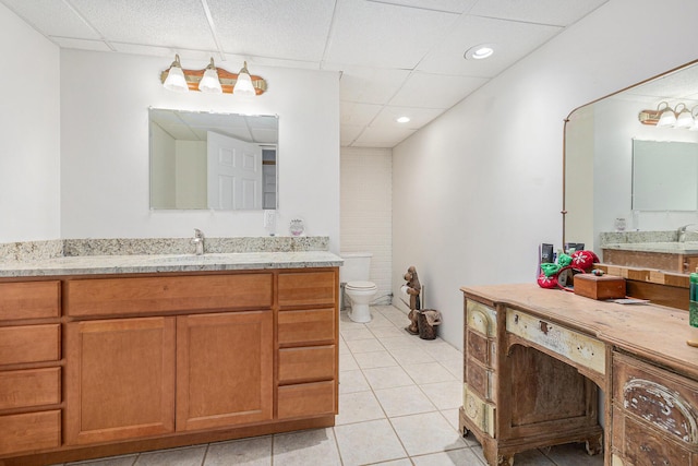 2269 W Liberty Rd, Clarklake, MI 49234 - full bathroom featuring a paneled ceiling, tile patterned flooring, toilet, vanity, and recessed lighting