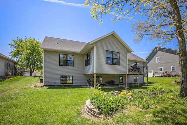 6927 Drumlin Dr, Zeeland, MI 49464 - back of house with a lawn and a deck