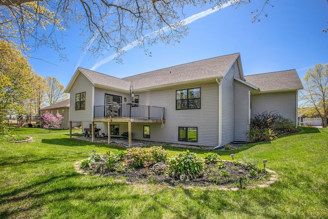 6927 Drumlin Dr, Zeeland, MI 49464 - back of property with a deck, a yard, and a shingled roof