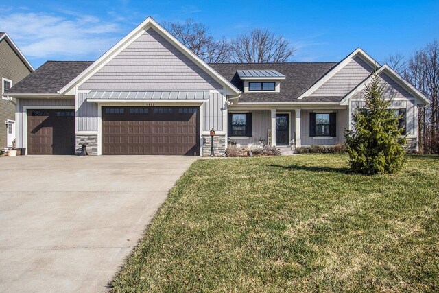 6927 Drumlin Dr, Zeeland, MI 49464 - craftsman inspired home featuring a garage, board and batten siding, driveway, and a front lawn