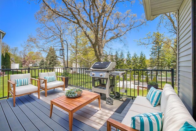 6927 Drumlin Dr, Zeeland, MI 49464 - wooden deck with an outdoor living space and area for grilling