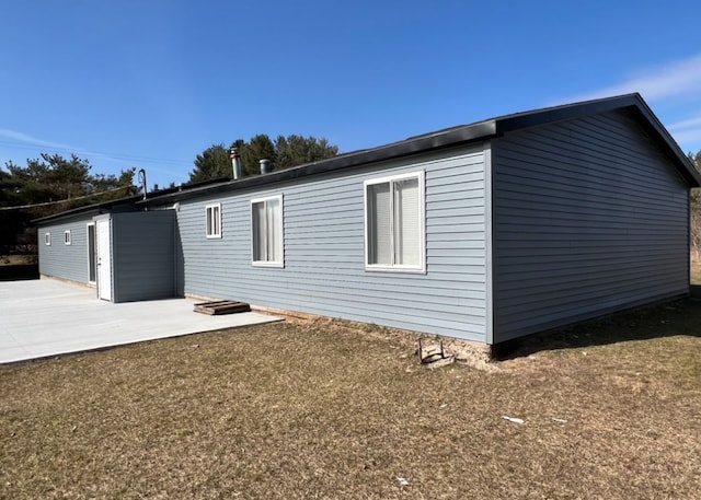 7368 Clear Lake Rd, Imlay City, MI 48444 - view of home's exterior with a patio area