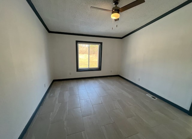7368 Clear Lake Rd, Imlay City, MI 48444 - unfurnished room with ornamental molding, a textured ceiling, a ceiling fan, and baseboards